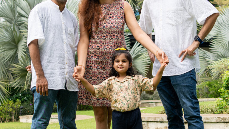 white katha shirt, oxford a line dress, and yellow bali uniesx shirt
