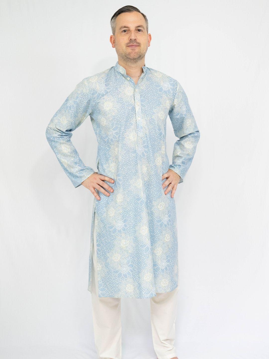 Men’s light blue cotton kurta with subtle floral pattern and white pajama trousers, breathable Indian ethnic wear. - Nimbu