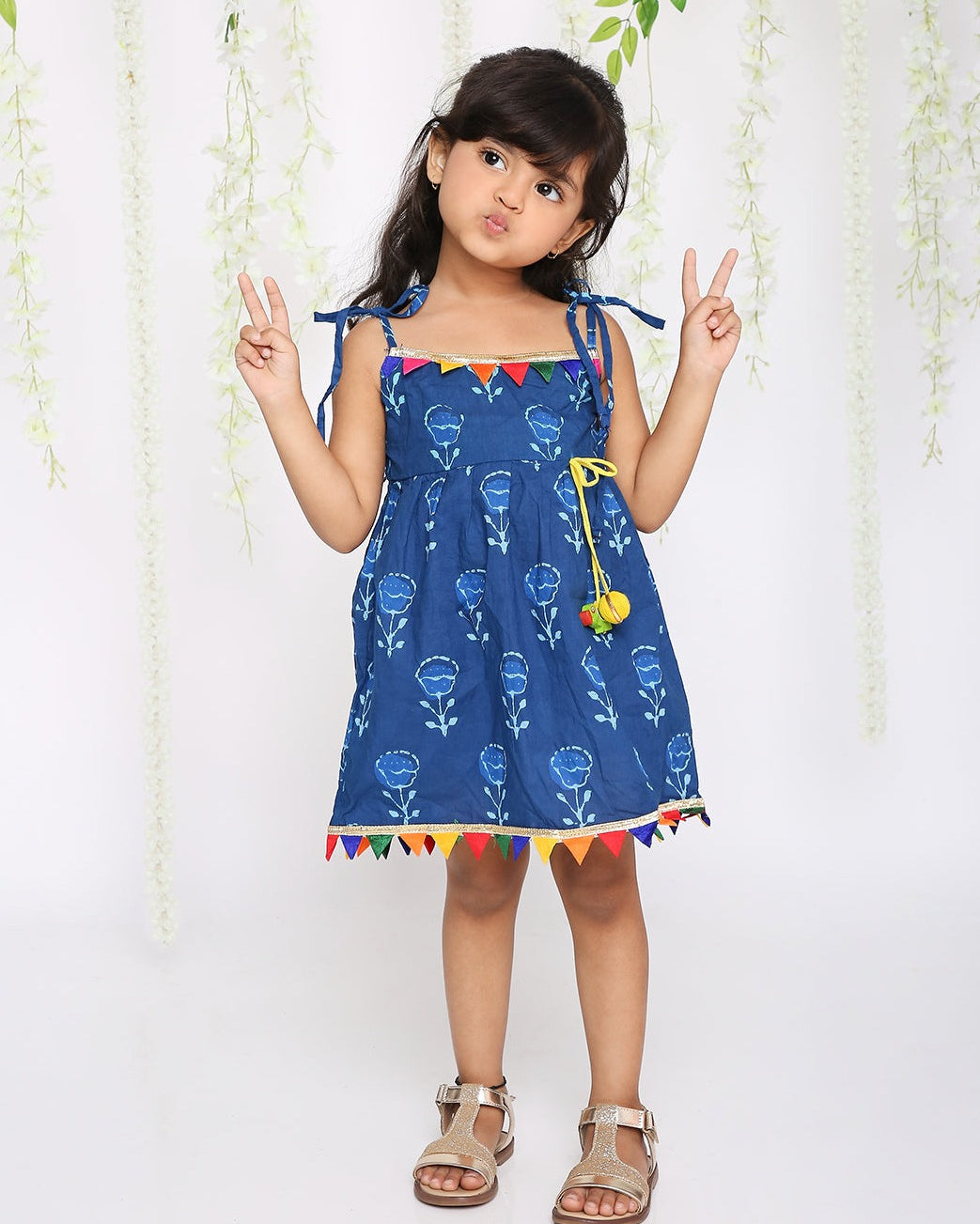 Blue rainbow frock with parrot tassel