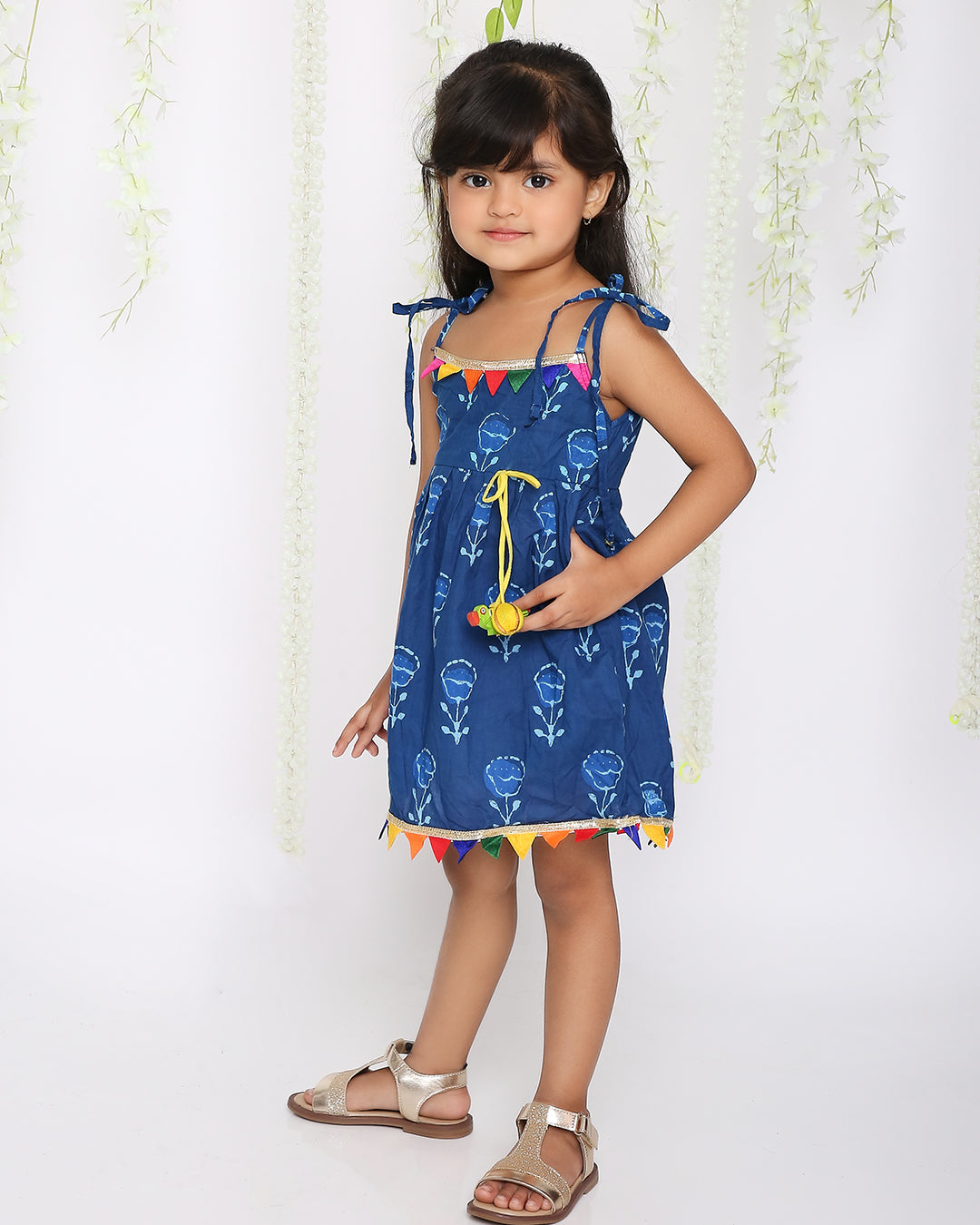 Blue rainbow frock with parrot tassel