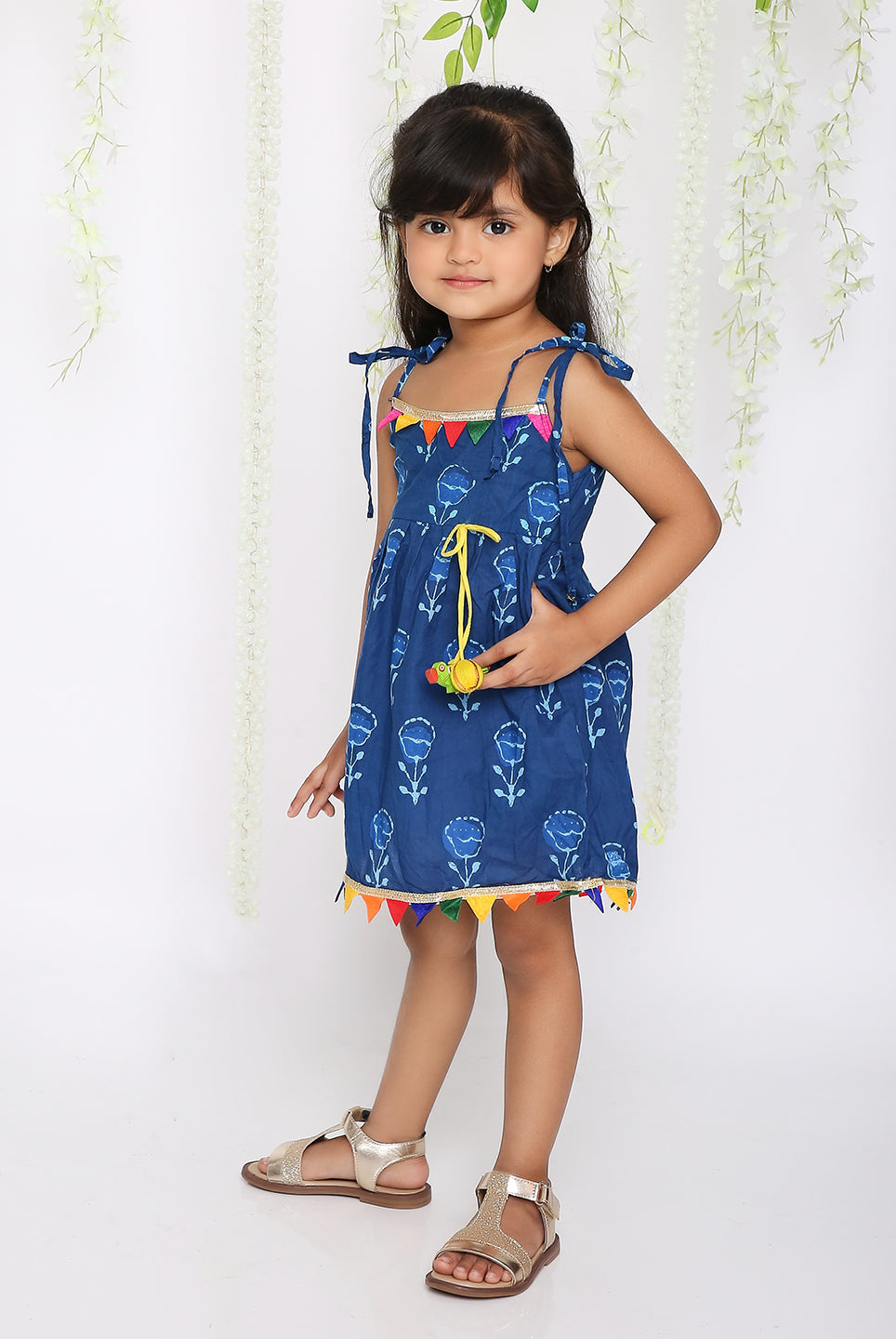 Blue rainbow frock with parrot tassel