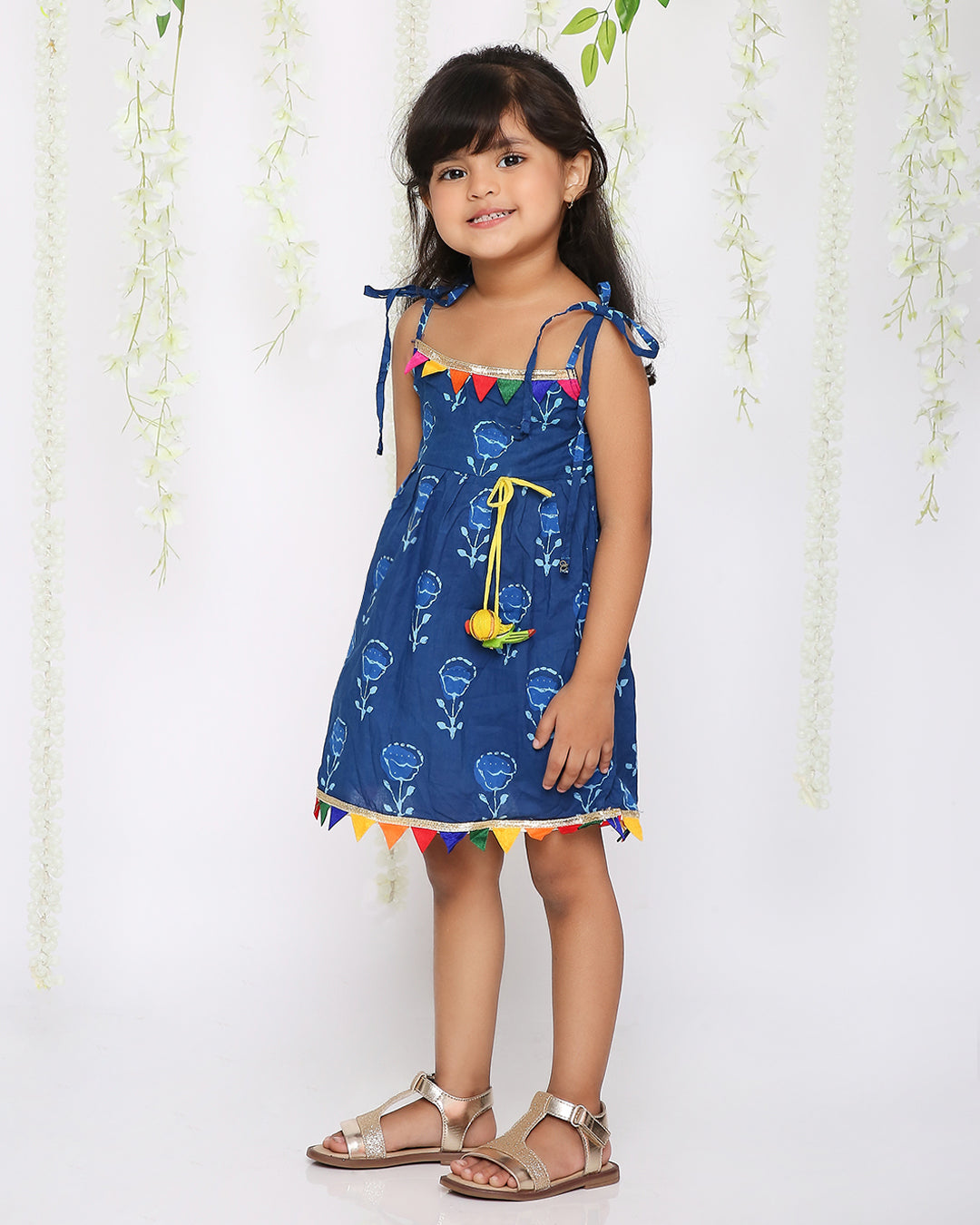 Blue rainbow frock with parrot tassel