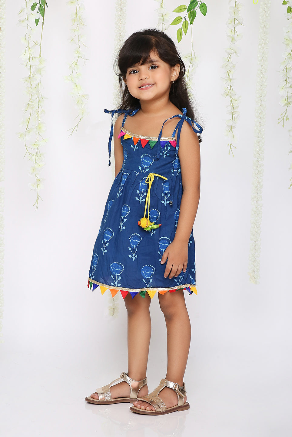 Blue rainbow frock with parrot tassel
