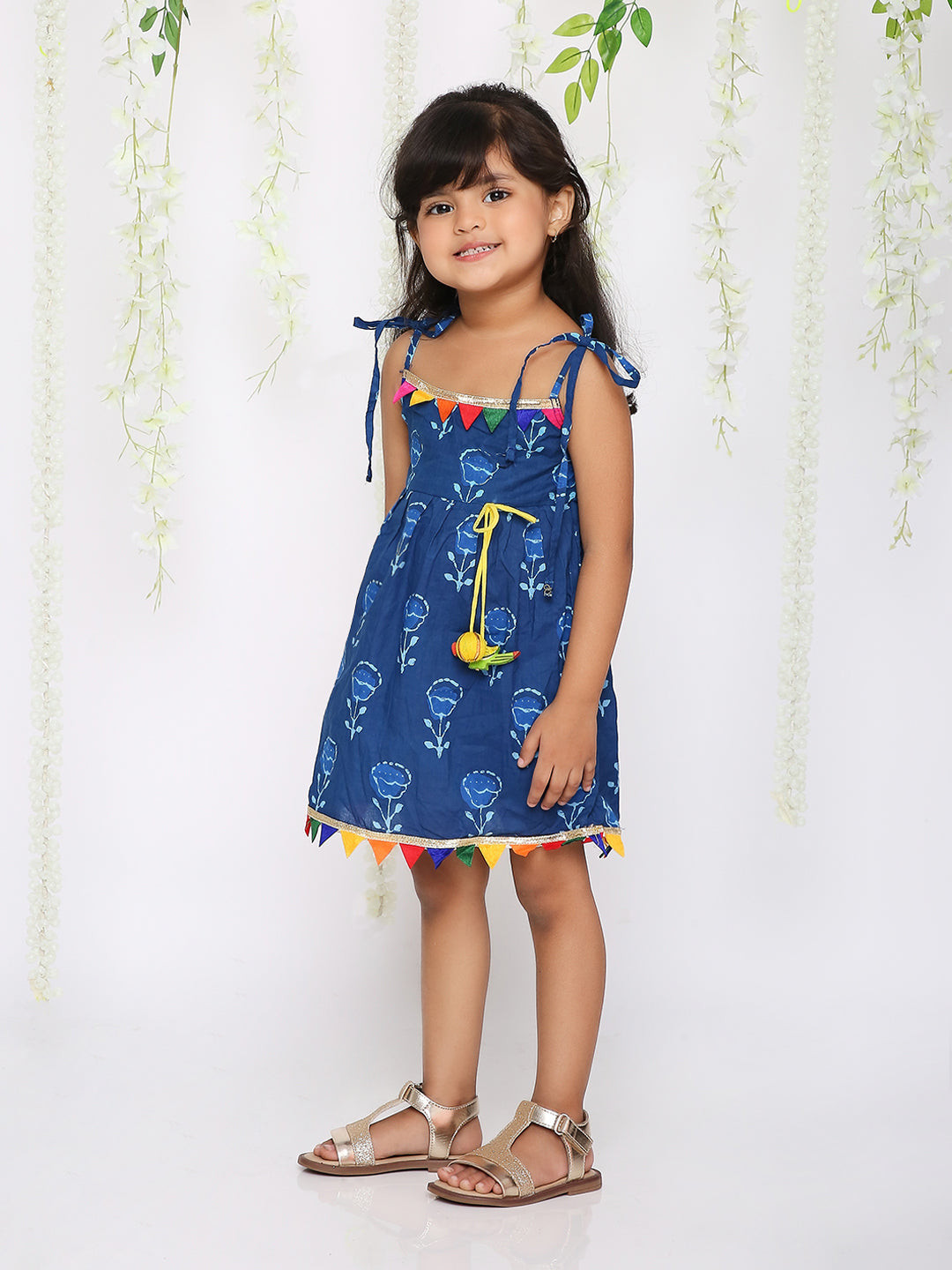 Blue rainbow frock with parrot tassel
