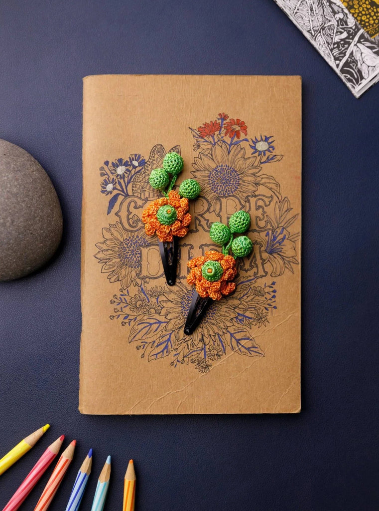 Crochet flower hair clip for girls in orange & green