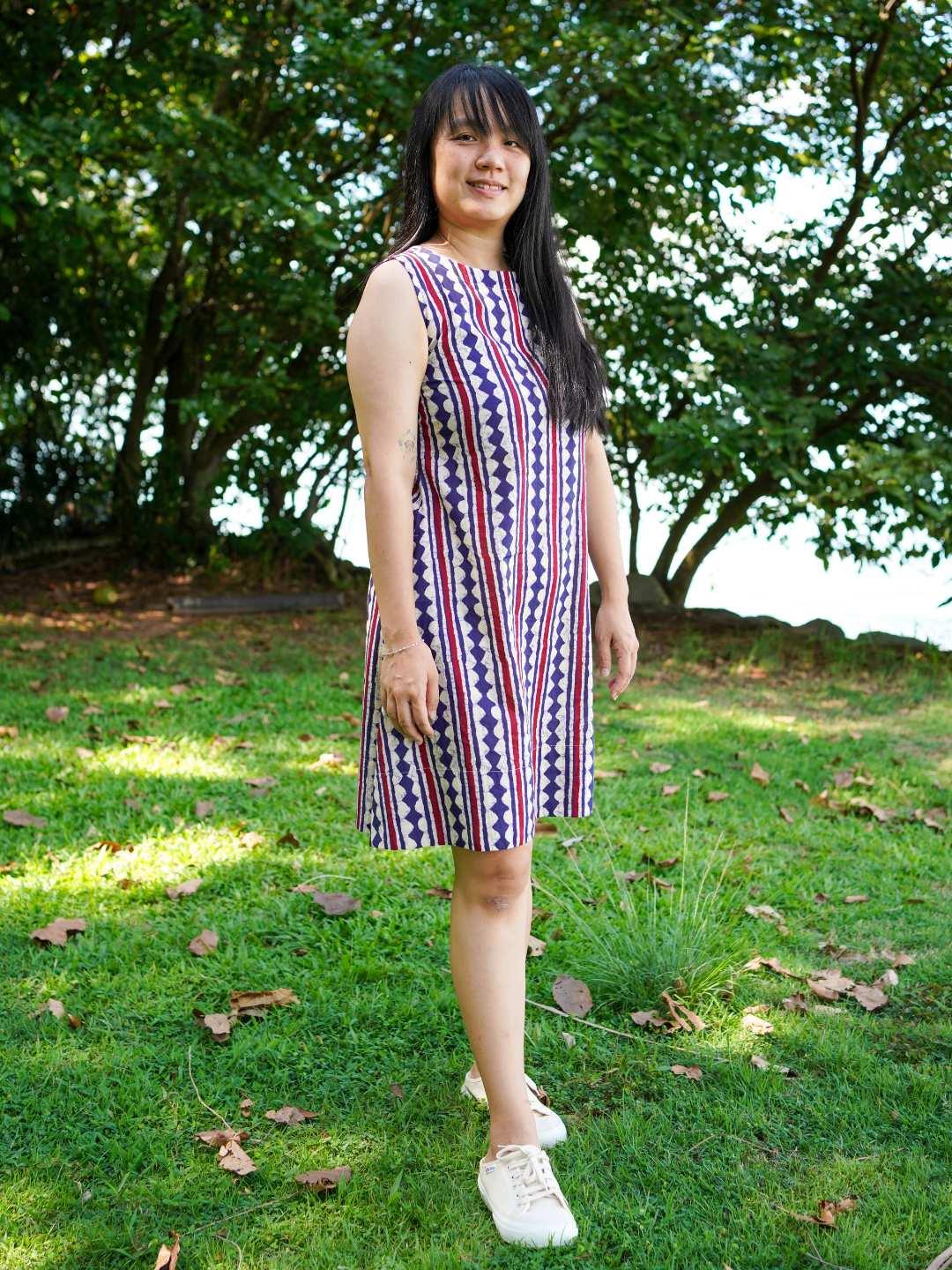 Azure sleeveless A-line dress with red and white stripes, made from sustainable cotton, casual women's summer style.