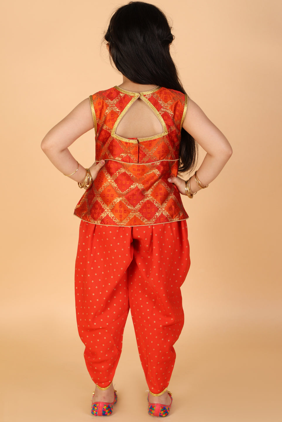 Nira Peplum top with Dhoti in orange