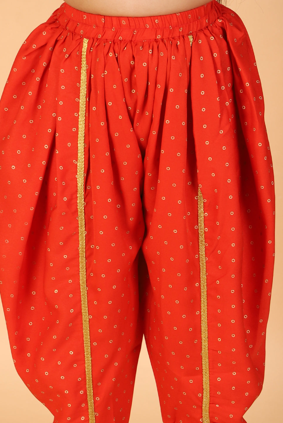 Nira Peplum top with Dhoti in orange