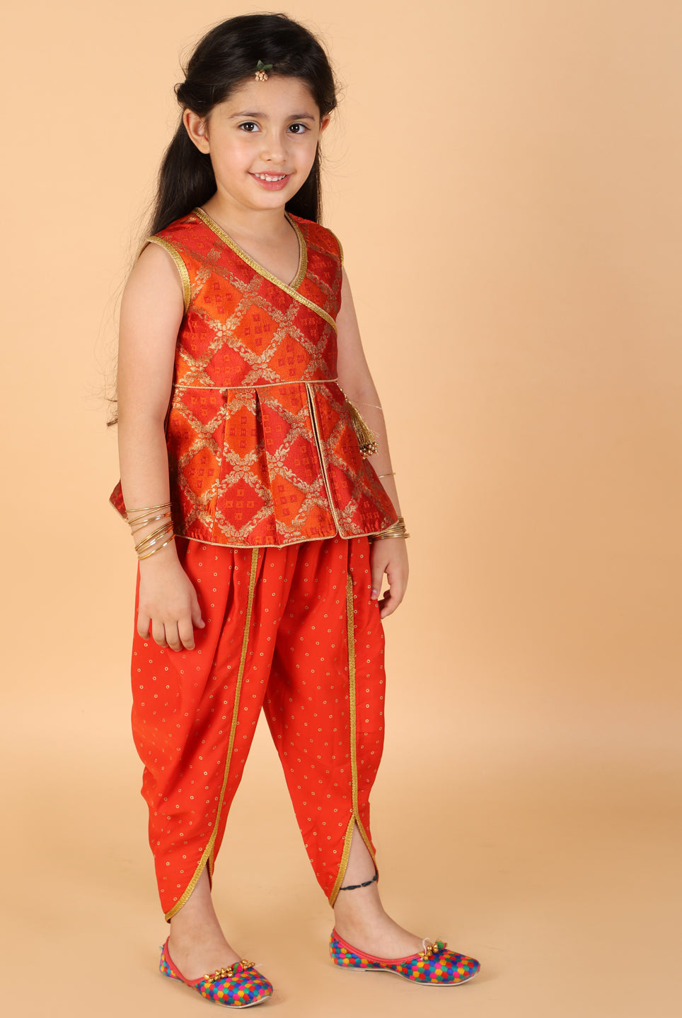 Nira Peplum top with Dhoti in orange