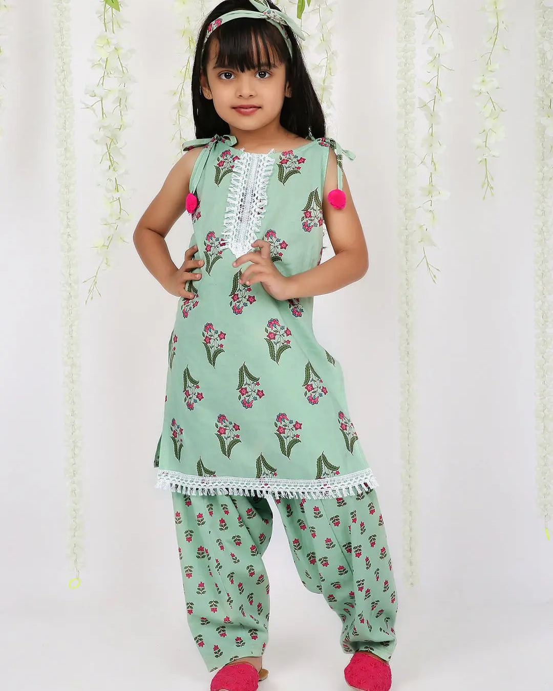 Spring green kurta salwar set with matching hair band