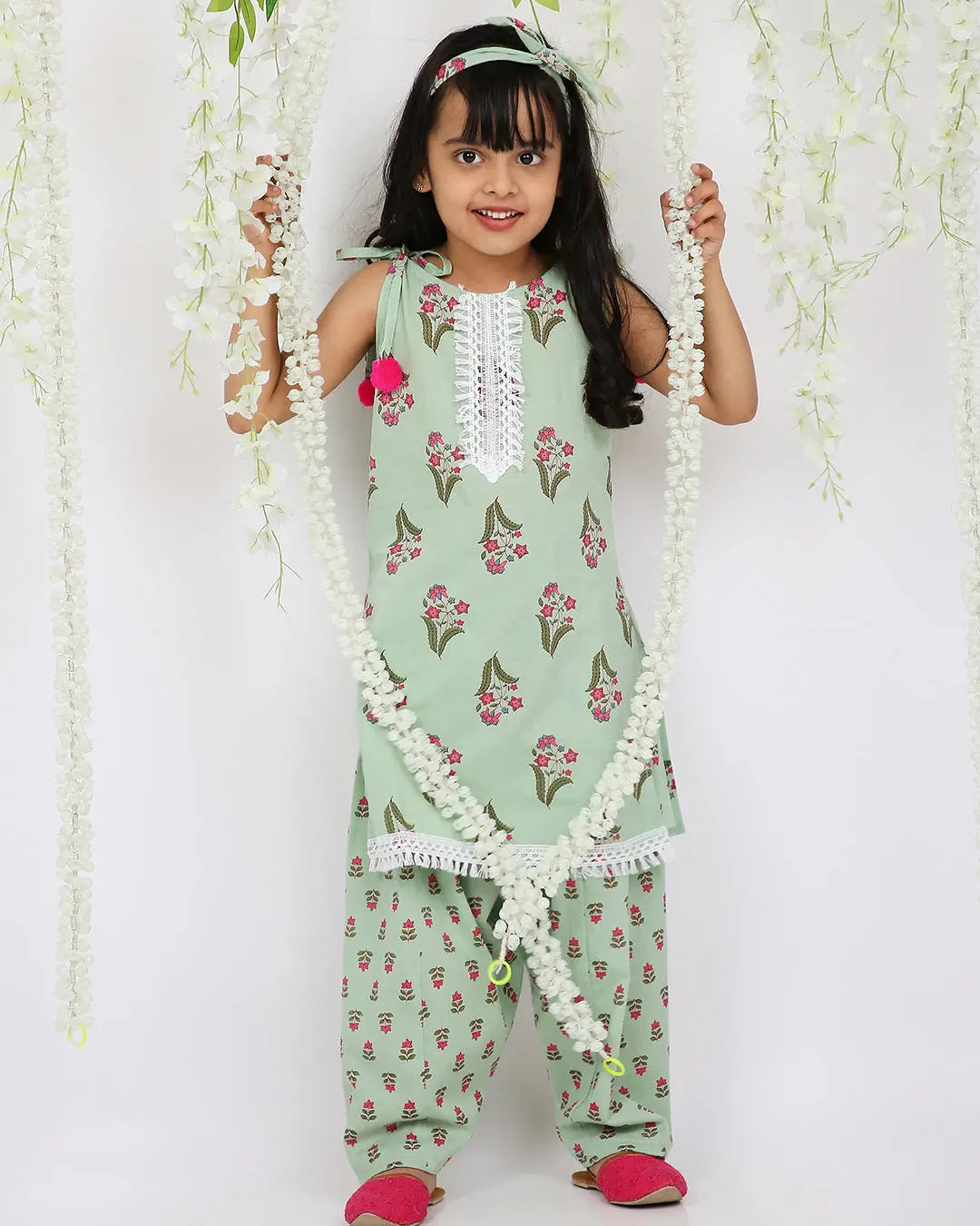 Spring green kurta salwar set with matching hair band