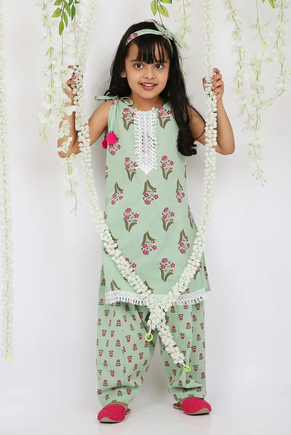 Spring green kurta salwar set with matching hair band