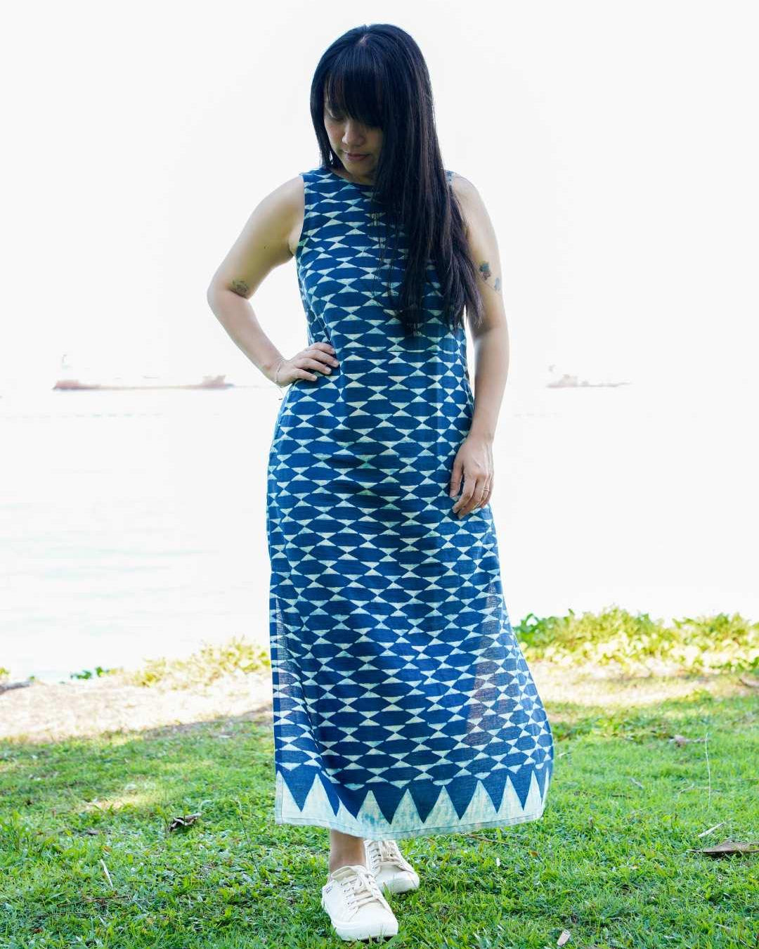Indigo sustainable cotton women’s maxi dress with geometric pattern and side slit.