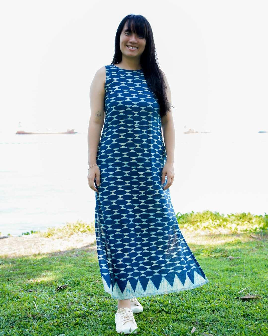 Indigo sleeveless Luna women's slit dress in sustainable cotton with geometric pattern and ankle-length hem.