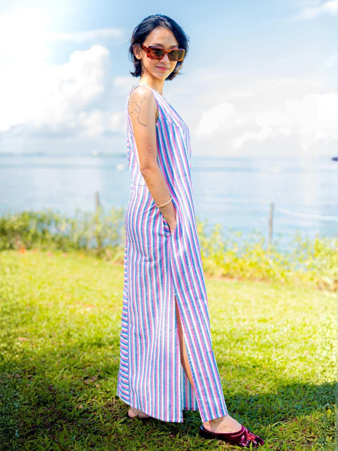 Blue and pink striped sustainable cotton slit dress for women, casual sleeveless style with side slit.
