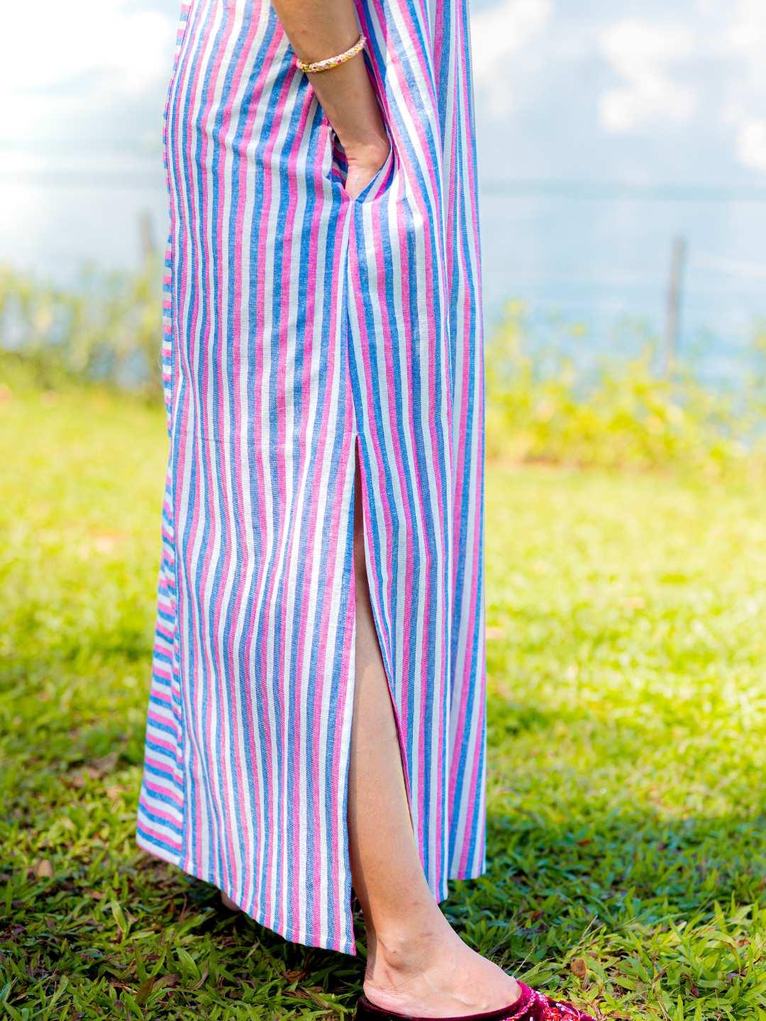 Blue and pink striped cotton slit dress with pockets, sustainable material, casual women’s summer style.