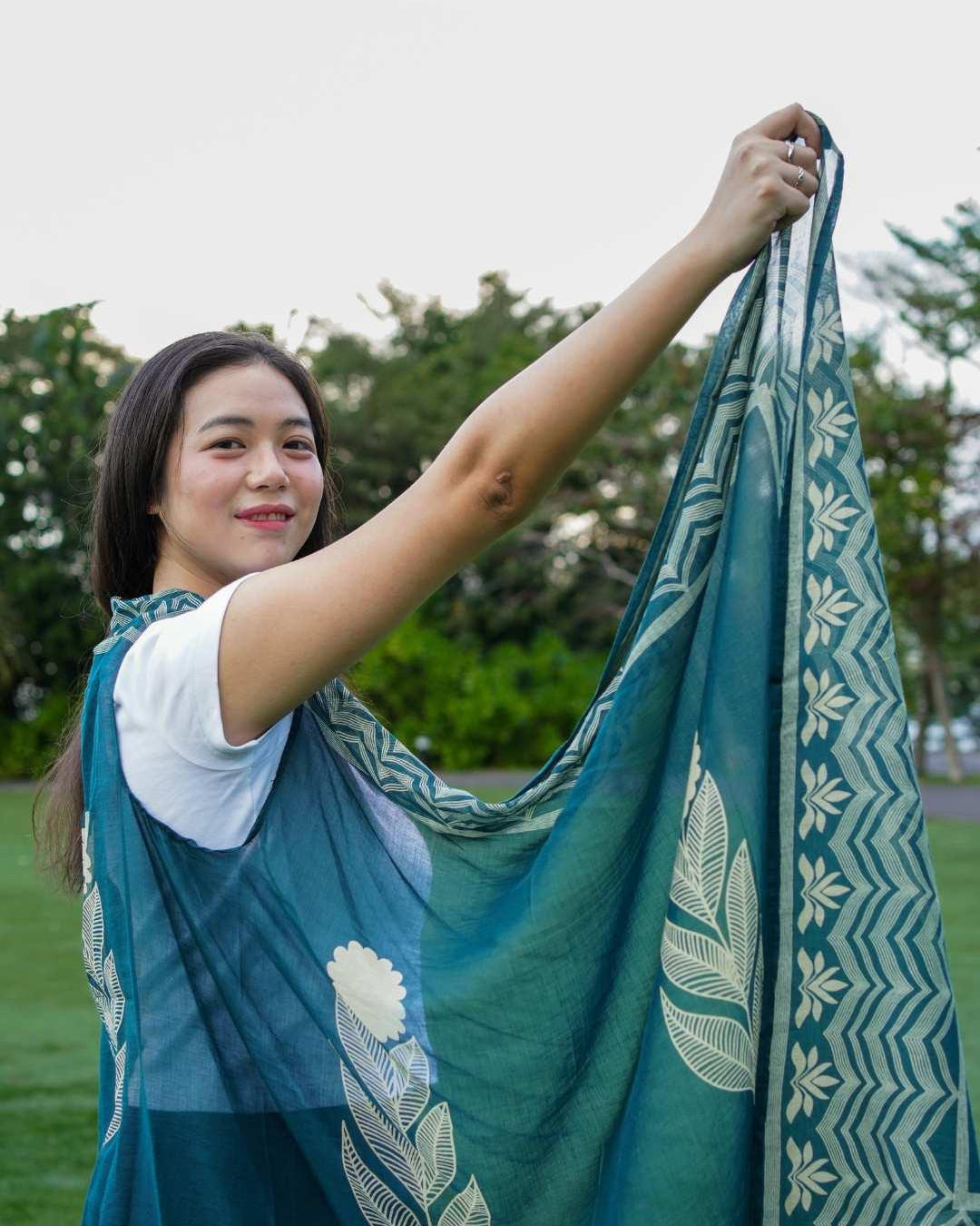 Indigo floral cotton kimono with geometric border, sustainable fabric, loose fit, perfect for women’s casual wear.