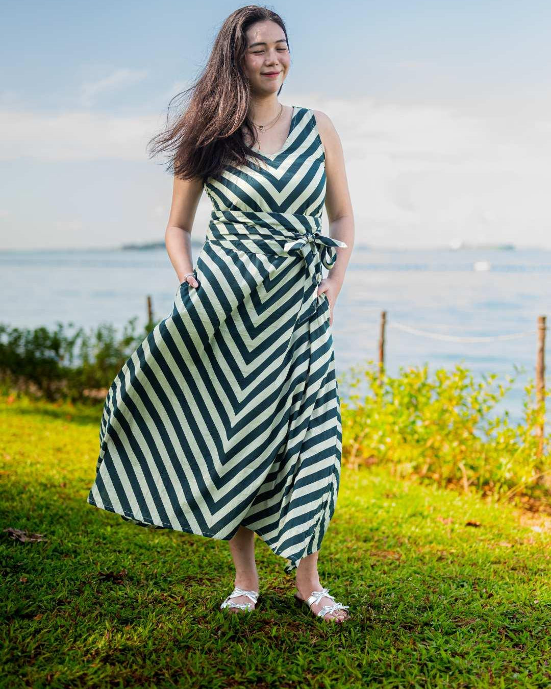 Green and white striped sustainable cotton dress with obi belt, sleeveless casual women’s midi dress.