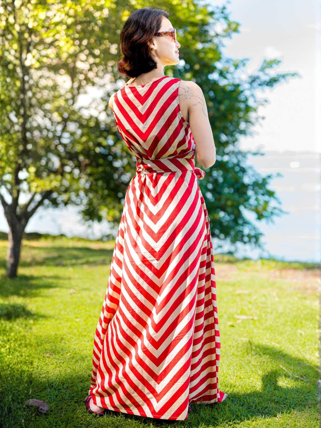 Red and white striped sleeveless women’s cotton dress with obi belt, sustainable and casual style.