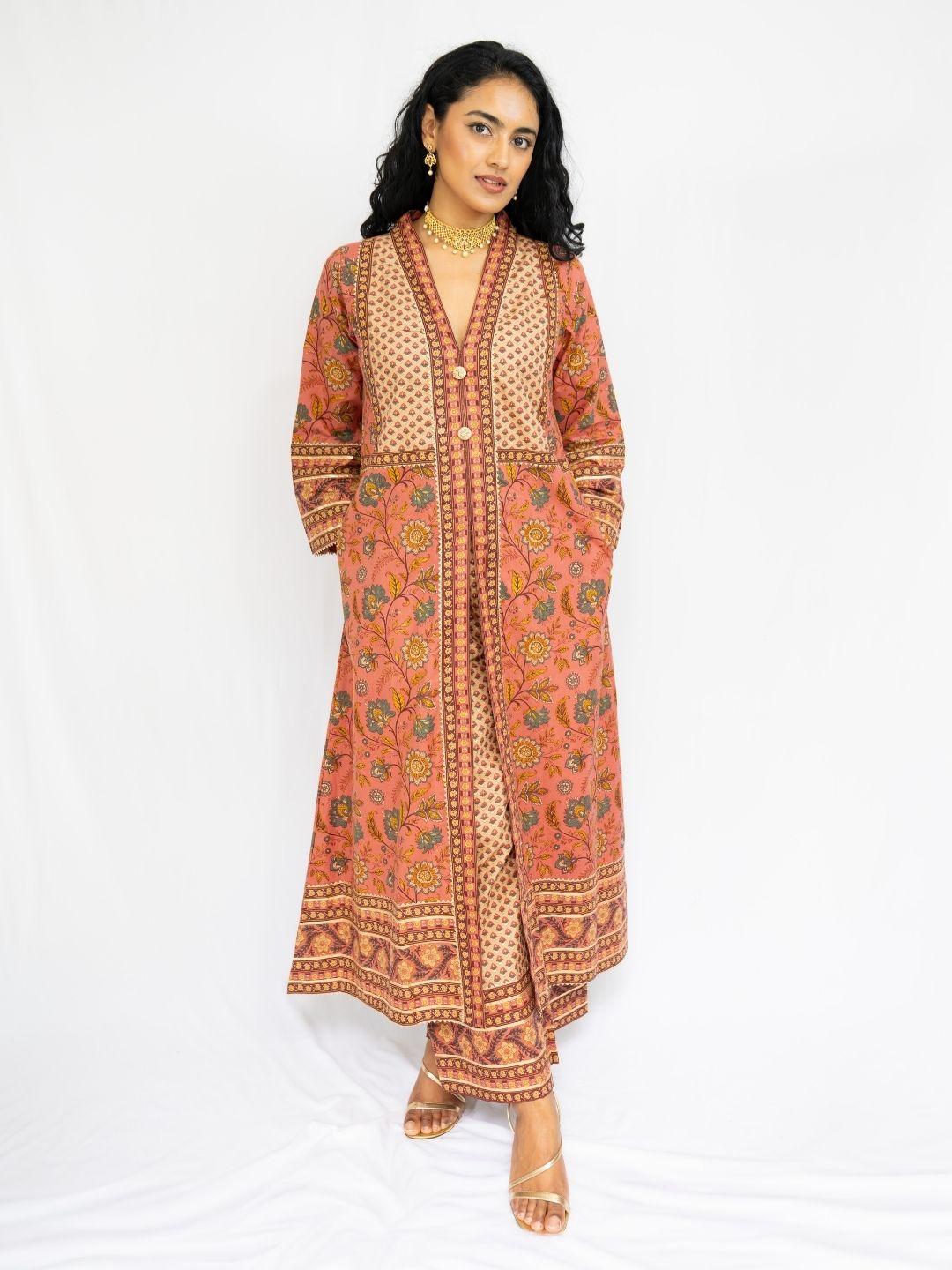 Women’s coral and gold printed kurti and pants set with a long open-front ethnic jacket and matching trousers. - Nimbu