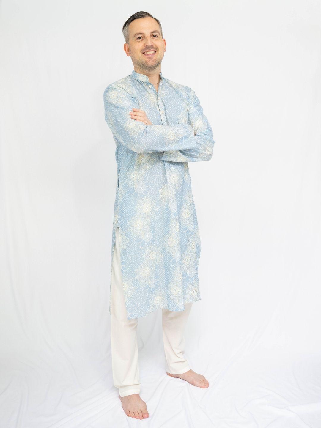 Light blue men’s ethnic kurta with subtle white patterning, paired with white pajama trousers. - Nimbu