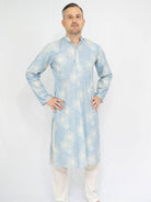 Men’s light blue cotton kurta with subtle floral pattern and white pajama trousers, breathable Indian ethnic wear. - Nimbu
