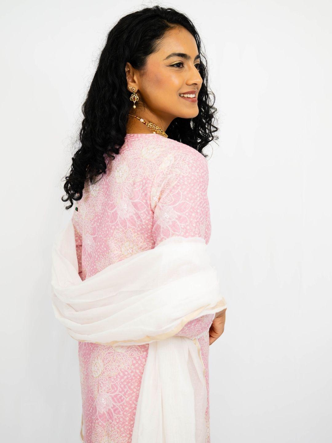 Pink embroidered cotton kurti with a sheer white dupatta, featuring a delicate floral pattern and handcrafted ethnic style. - Nimbu