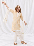 Girl wearing a pale yellow embroidered kurti and matching pants with a flowing dupatta, finished with delicate lace trim. - Nimbu