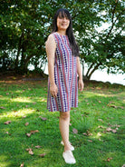 Azure sleeveless A-line dress with red and white stripes, made from sustainable cotton, casual women's summer style.