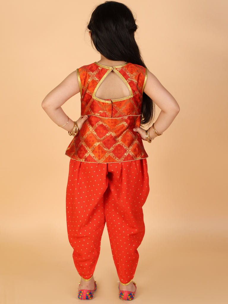 Nira Peplum top with Dhoti in orange