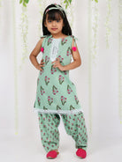 Spring green kurta salwar set with matching hair band