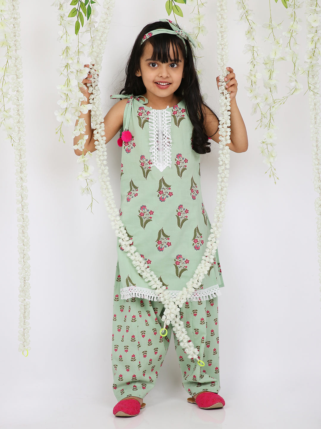 Spring green kurta salwar set with matching hair band