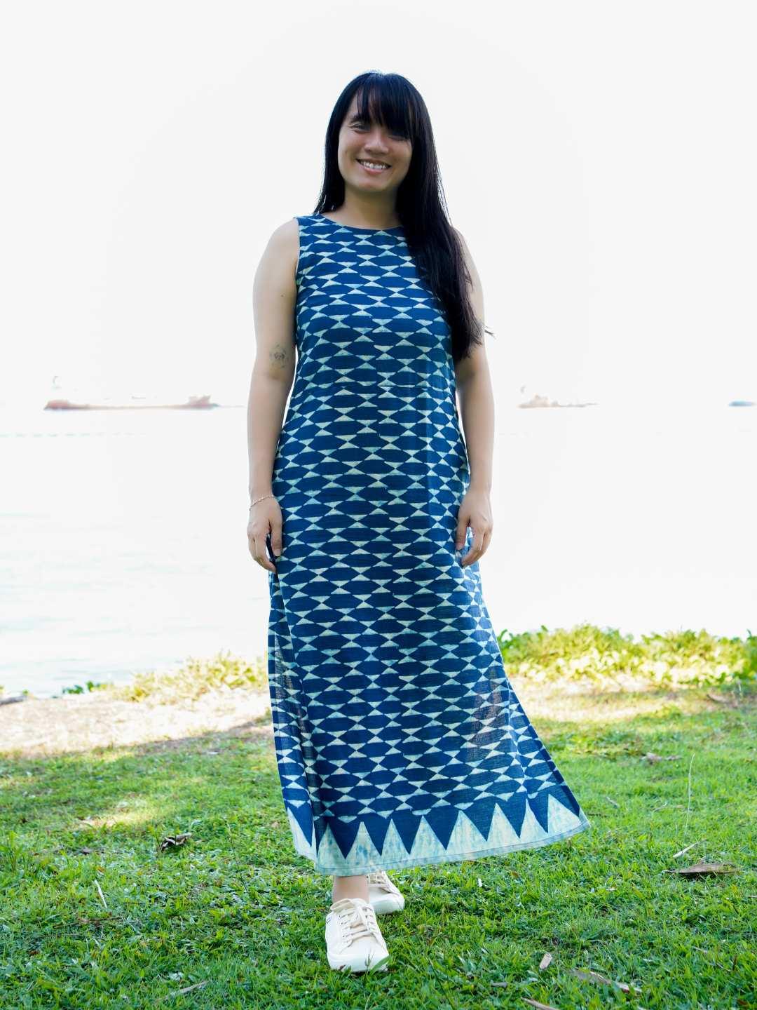 Indigo sleeveless Luna women's slit dress in sustainable cotton with geometric pattern and ankle-length hem.