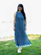 Indigo sleeveless Luna women's slit dress in sustainable cotton with geometric pattern and ankle-length hem.