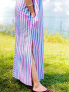 Blue and pink striped cotton slit dress with pockets, sustainable material, casual women’s summer style.