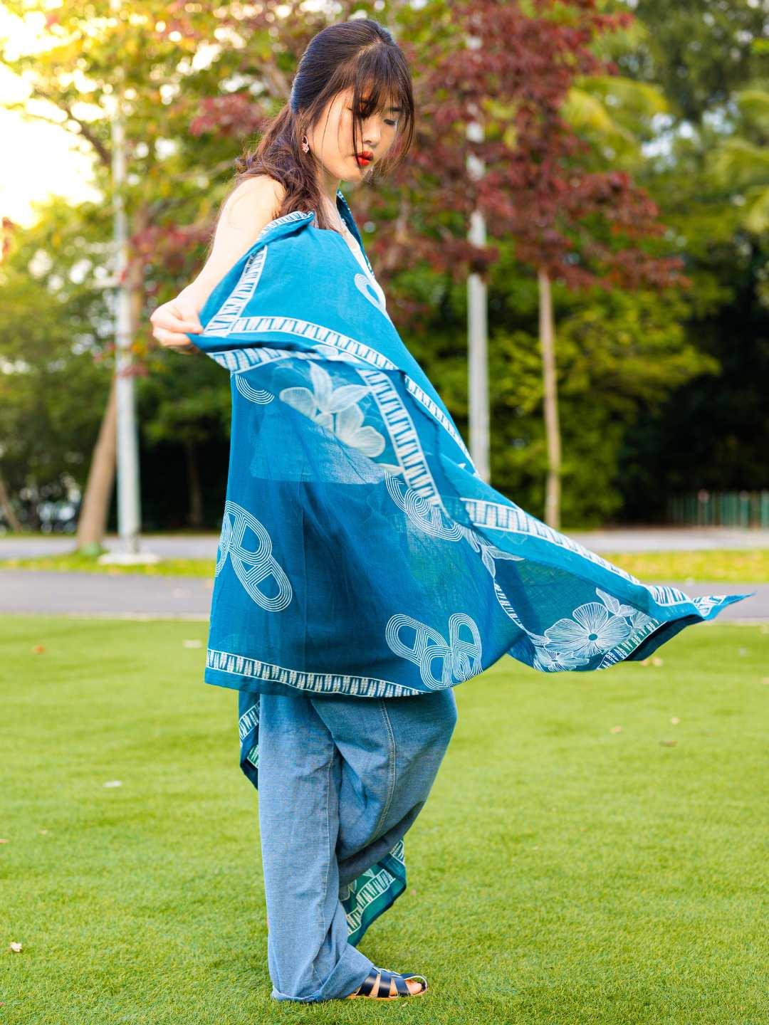 Indigo kimono with white pretzel pattern, lightweight sustainable cotton, casual women's free size wrap style.